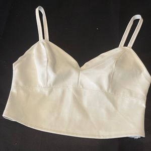 Ivory cropped tank. Polyester/spandex